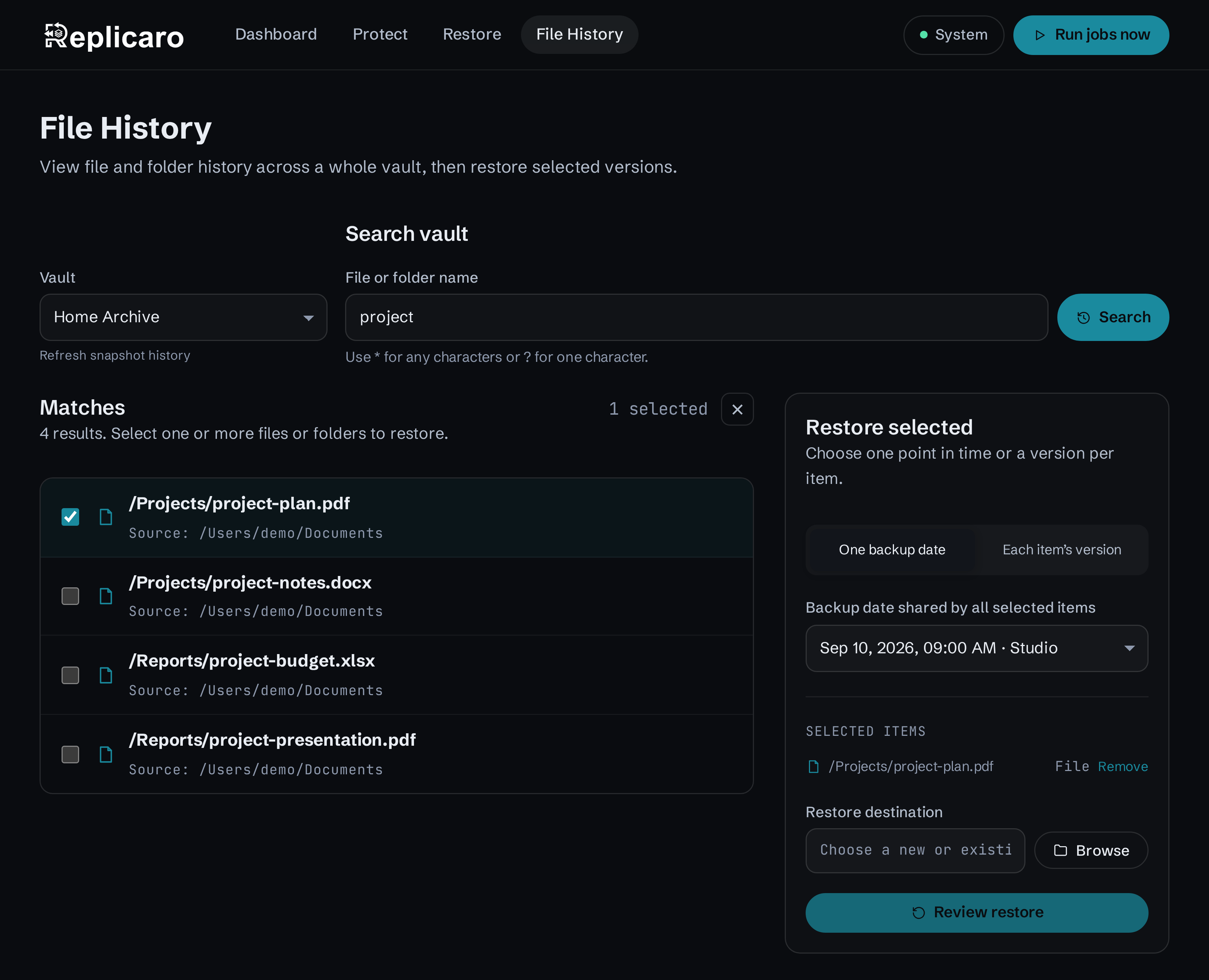 Replicaro File History screen showing file search and version selection.